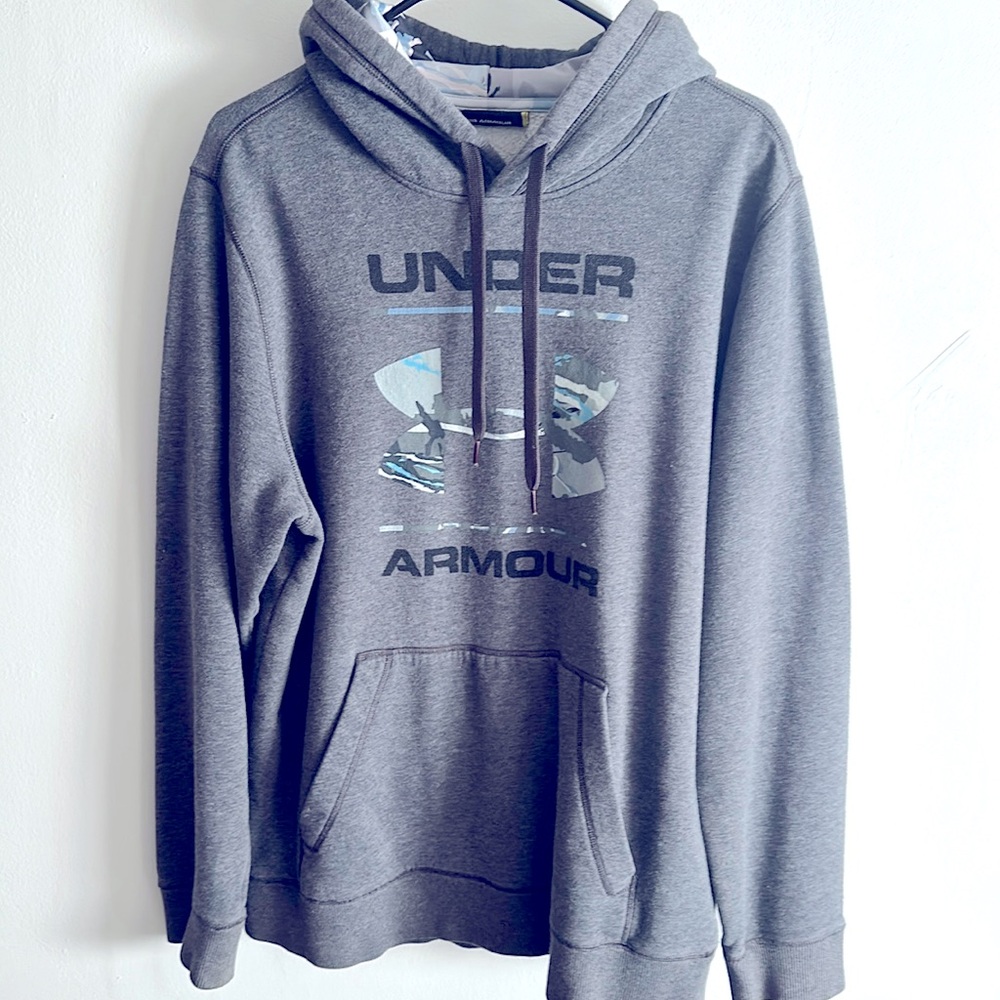 Under Armour size medium men’s hoodie with blue camo lining. Very soft